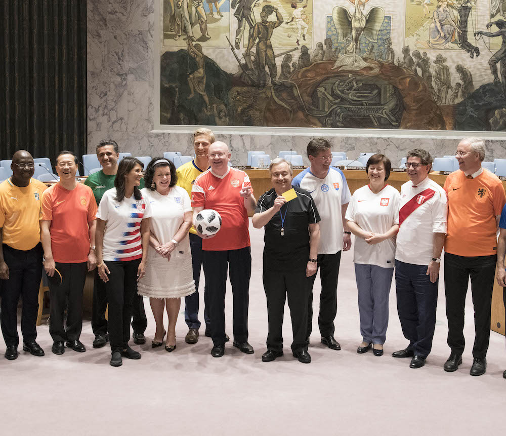 UN ambassadors in national team jerseys.