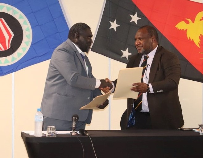 ABG President Ishmael Toroama, left, and PNG Prime Minister James Marape meeting in April 2022 (ABG/Facebook)