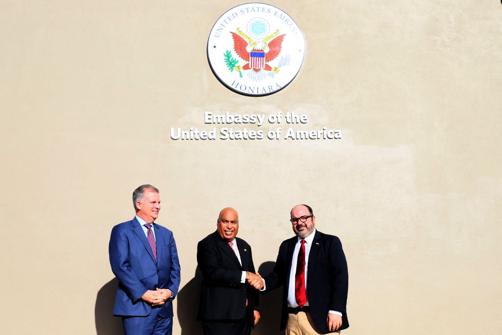 Solomon Islands Ministry of Foreign Affairs and External Trade Permanent Secretary Colin Beck (centre) with US State Department officials Taylor Ruggles (left) and Russell Comeau during the reopening ceremony of the US embassy in Honiara in February (Charley Piringi/AFP via Getty Images)