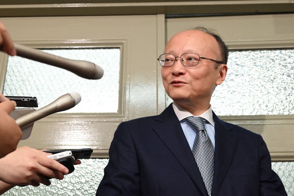 Masato Kanda, in April, speaking to the media as Japan's vice minister of finance for international affairs (JIJI Press/AFP via Getty Images)