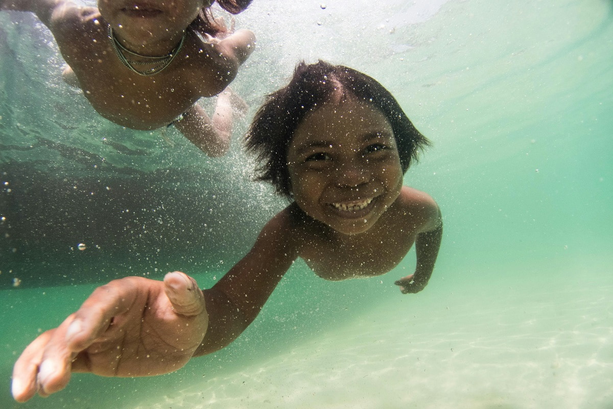 Moken boys swimming