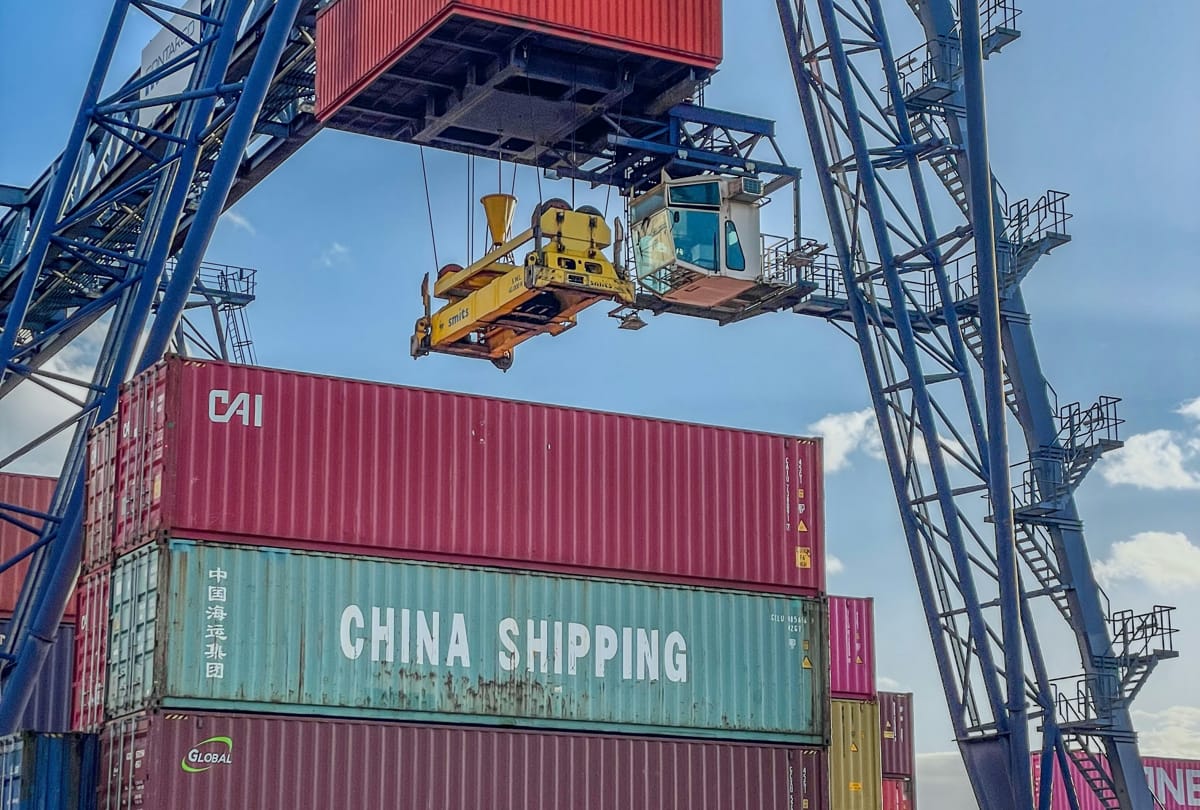 Shipping containers on the dock (Bernd Dittrich/Unsplash)
