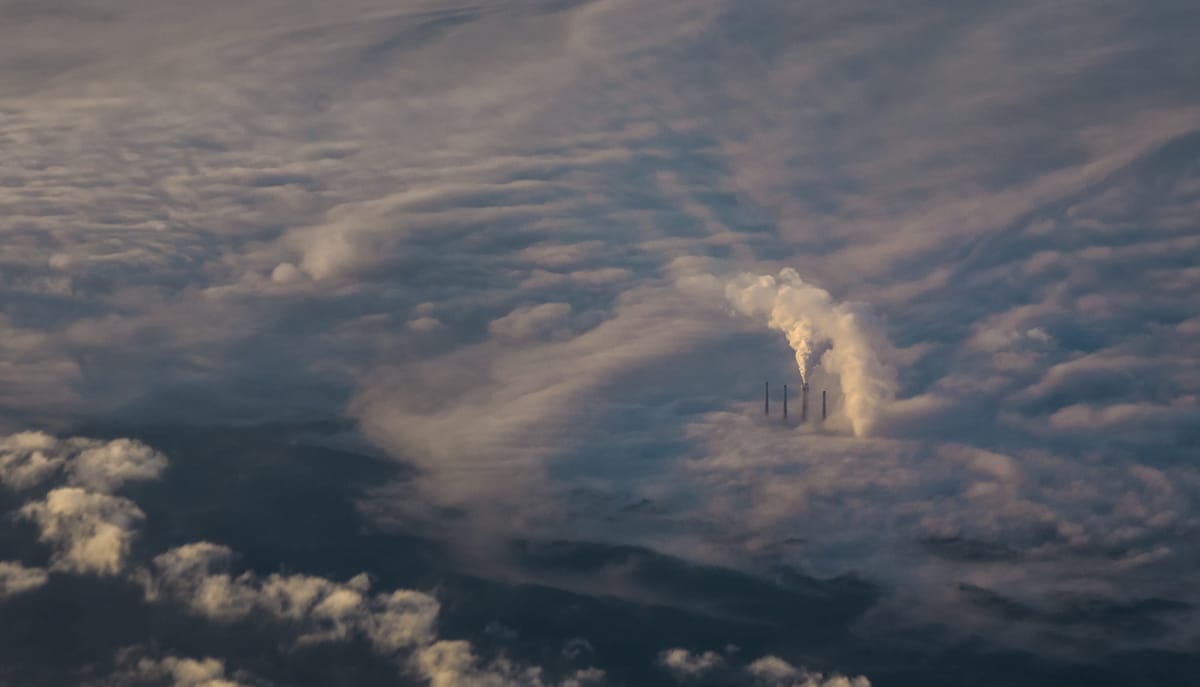 Firms should be charged for their contribution to pollution, including carbon pollution, by the governments in the countries where they generate this pollution (Nik Shuliahin/Unsplash)