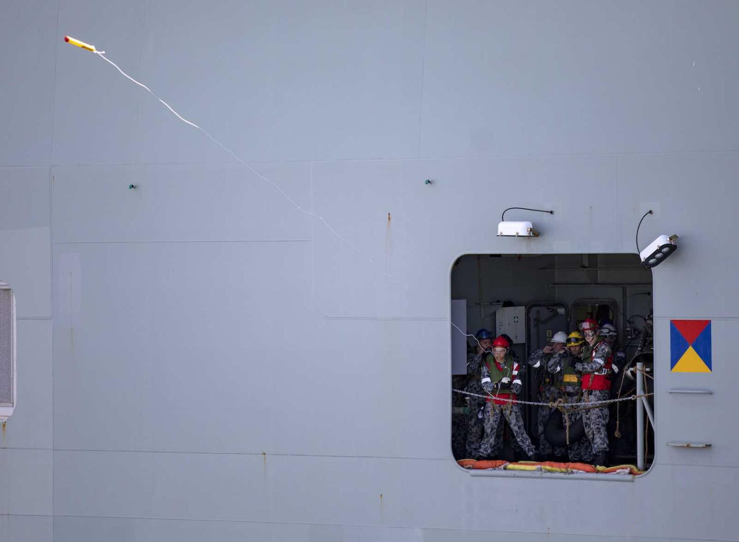 HMAS Canberra fire the lines for replenishment from HMAS Success as part of Indo-Pacific Endeavour 2019 (Department of Defence)