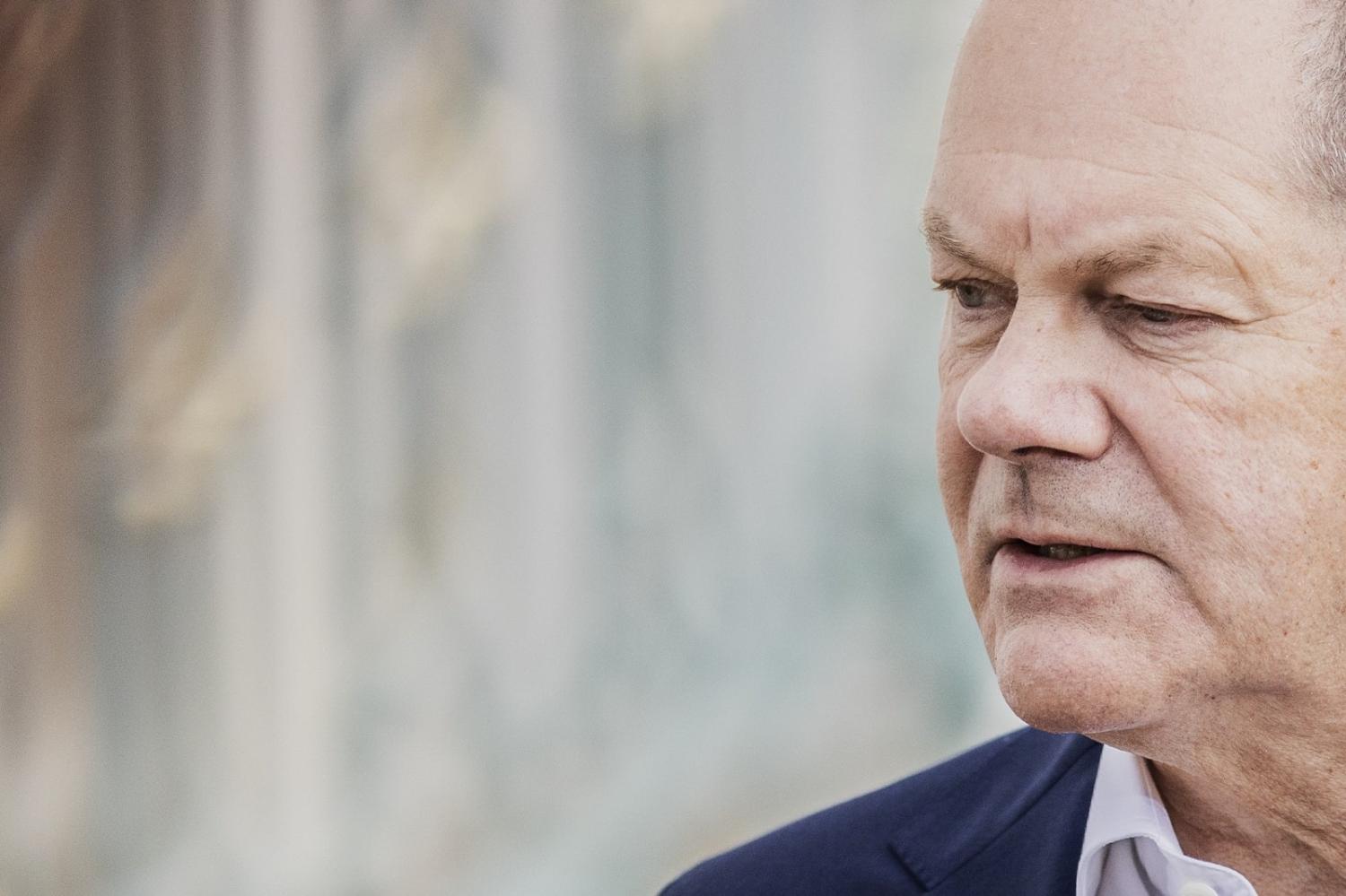 German Chancellor Olaf Scholz speaks to media during the cabinet meeting at Meseberg Castle, Germany, 30 August 2022 (Florian Gaertner/Photothek via Getty Images)