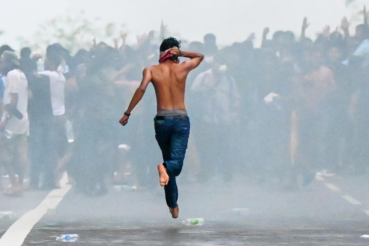 Anti-government protesters demonstrate in Colombo, Sri Lanka, against the country's crippling economic crisis, 29 May 2022 (Ishara S. Kodikara/AFP via Getty Images)