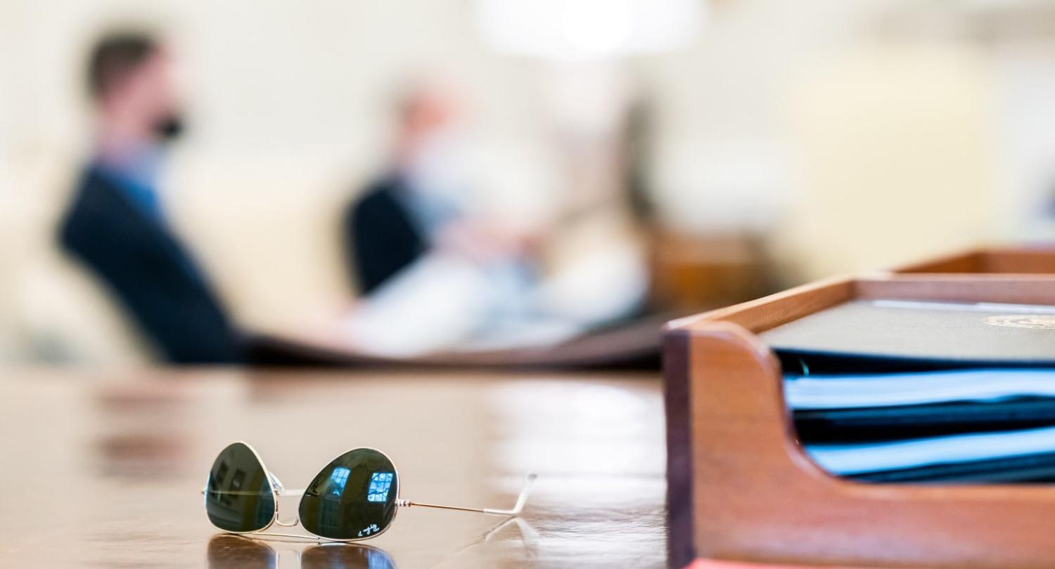 US President Joe Biden's sunglasses during a meeting with White House staff in the Oval Office of the White House (Cameron Smith/White House/Flickr)