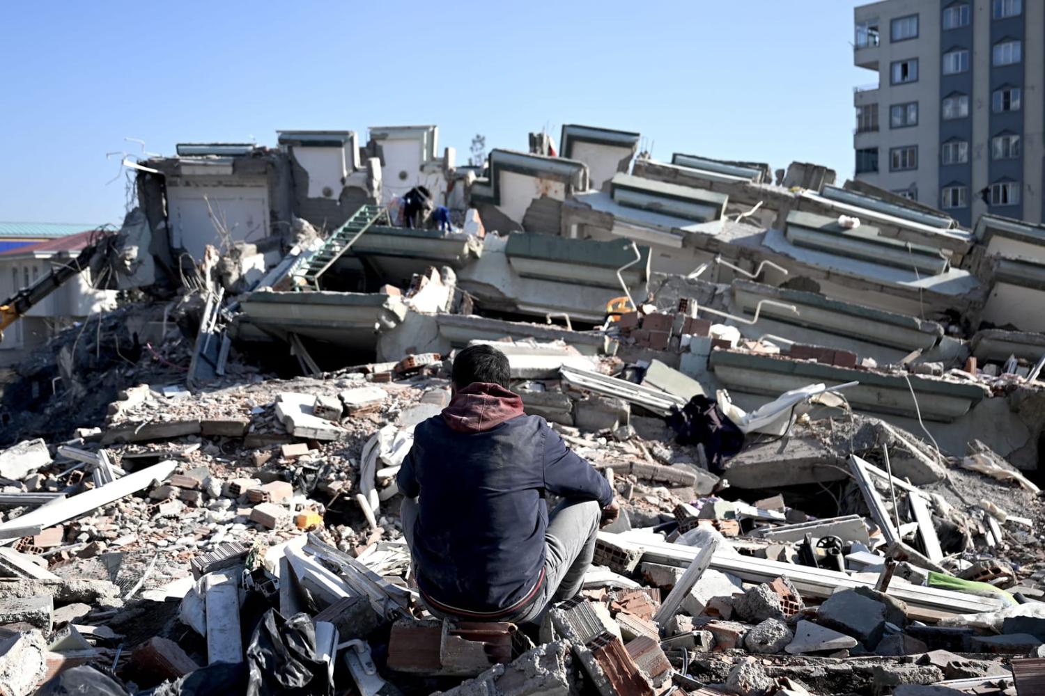 The rubble of collapsed buildings in Kahramanmaras, on 9 February, three days after a 7.8-magnitude earthquake struck southeast Turkey (Ozan Kose/AFP via Getty Images)