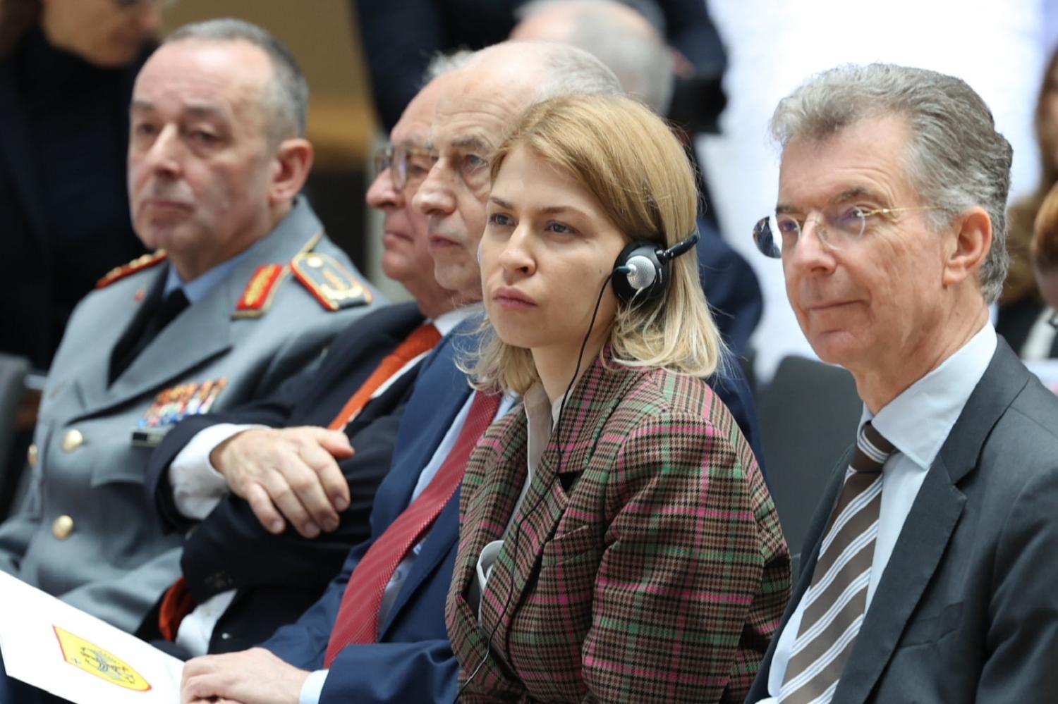 Chair of the Munich Security Conference Christoph Huesgen (R) and Deputy Prime Minister for European and Euro-Atlantic Integration of Ukraine Olha Stefanishyna (2R) at the MSC, 13 February 2023 (Jörg Carstensen/picture alliance via Getty Images)