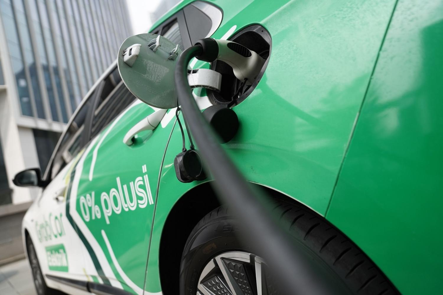 A GrabCar electric vehicle at a charging station in Jakarta, Indonesia (Dimas Ardian/Bloomberg via Getty Images)