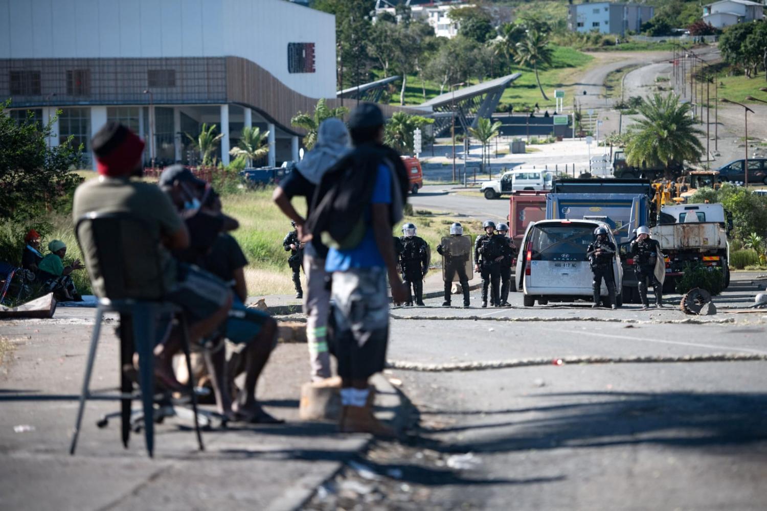 Stand-off: French gendarmes face pro-independence protesters in New Caledonia (Delphine Mayeur/AFP via Getty Images)