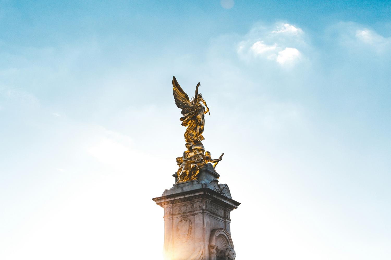 The figure of Winged Victory atop the Queen Victoria Memorial outside Buckingham Palace, London (Thomas Kelley/Unsplash)