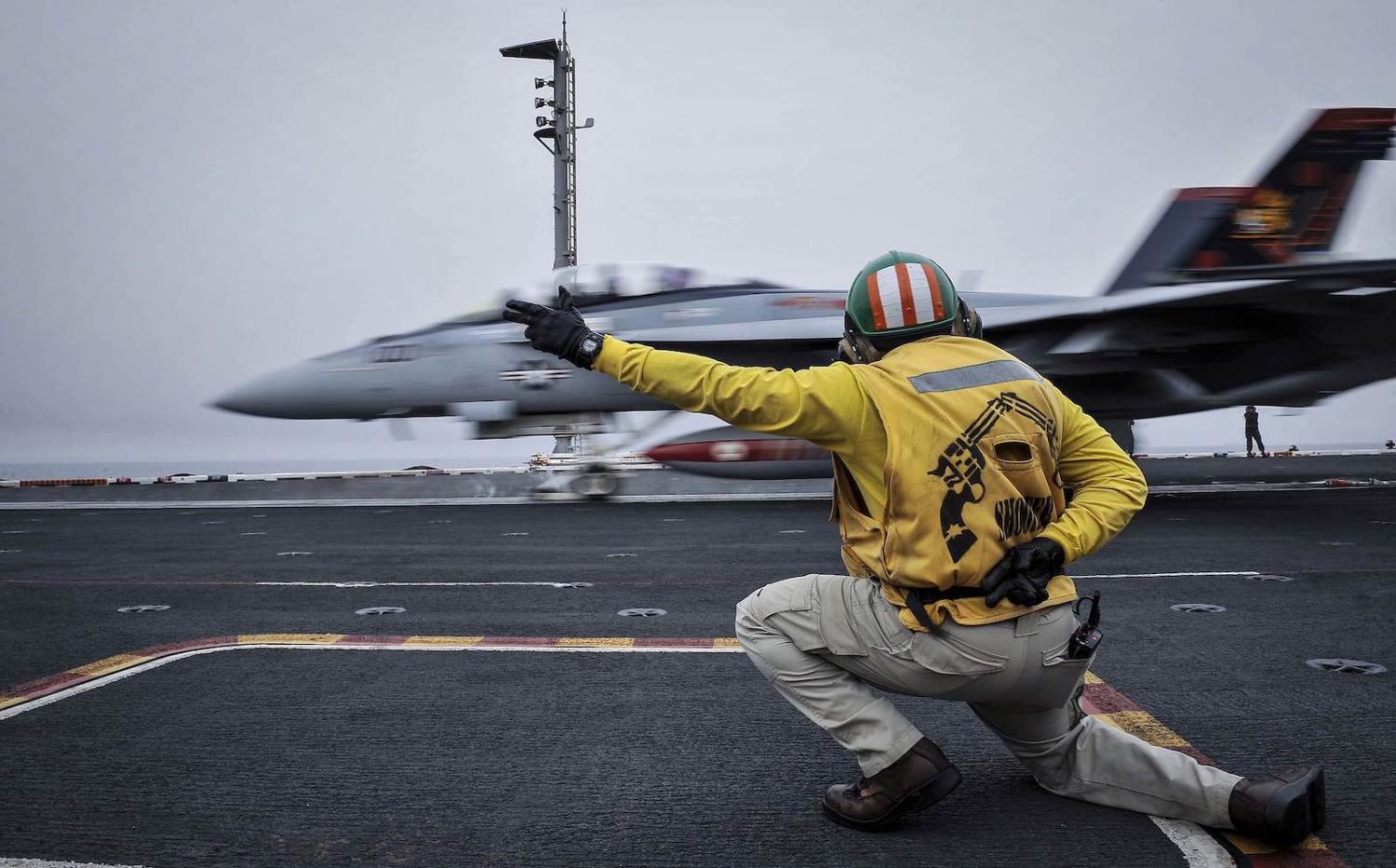An F/A-18F Super Hornet takes off from aircraft carrier USS Theodore Roosevelt during Exercise Malabar 2015 (US Embassy New Delhi/Flickr)
