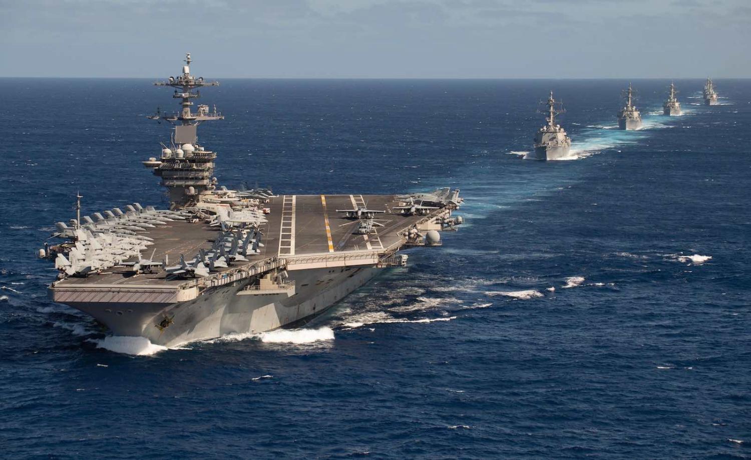 The US Theodore Roosevelt Carrier Strike Group in formation on transit last month to an Indo-Pacific deployment (Photo: US Navy/Flickr)