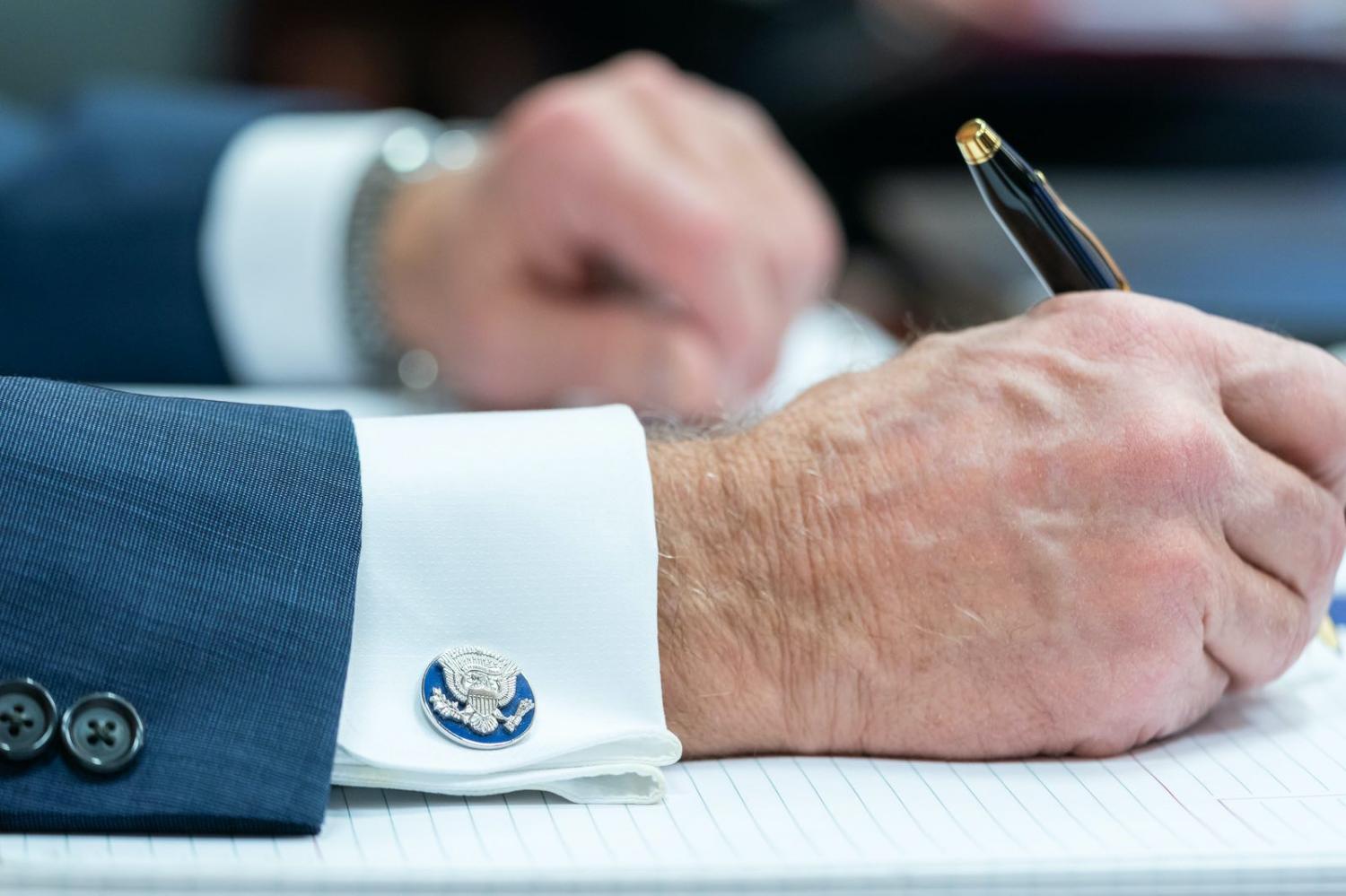 US President Joe Biden takes notes doing a G7 Leaders’ Virtual Meeting in February (White House/Flickr)
