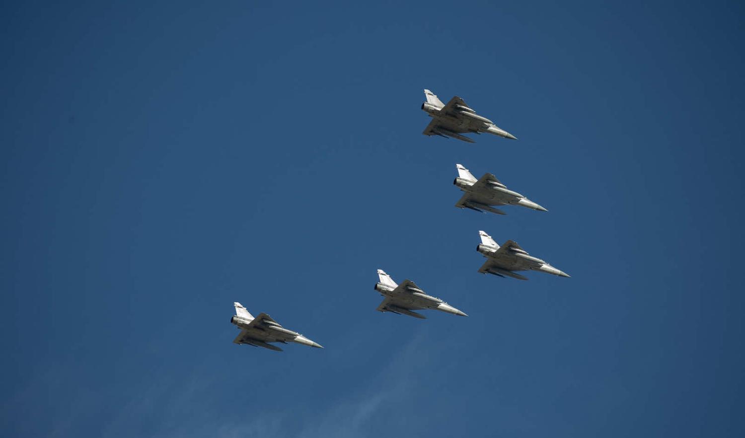 Republic of China Air Force fighters perform a fly-over above Taipei (Wang Yu Ching/Taiwan Presidential Office/Flickr)