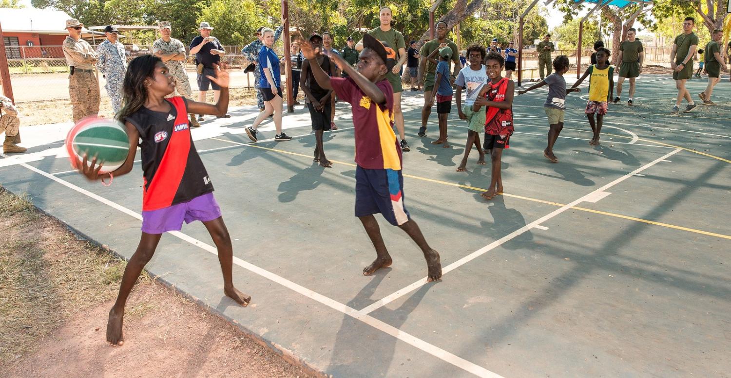 Local children with US Marines and ADF personnel in Warruwi, South Goulbourn Island, West Arnhem. (Photo: Sergeant Janine Fabre, Australian Army)