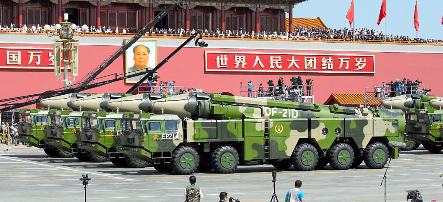 DF-21D anti-ship ballistic missiles drive through Tiananmen Square during a military parade on September 3, 2015. (Getty/Asahi Shimbun)