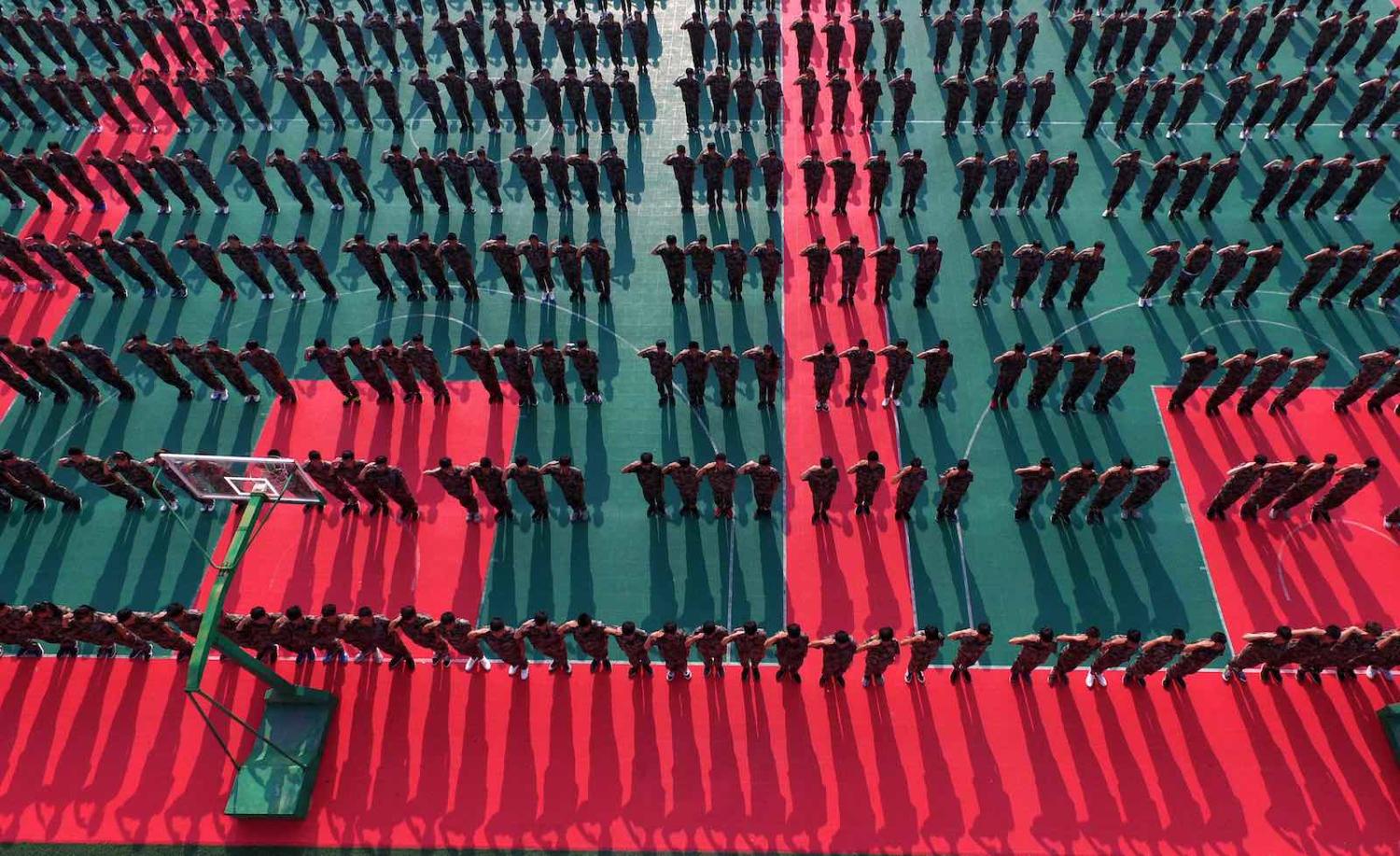 New high school students undertake a 10-day military training course at the beginning of term (Photo: VCG via Getty)