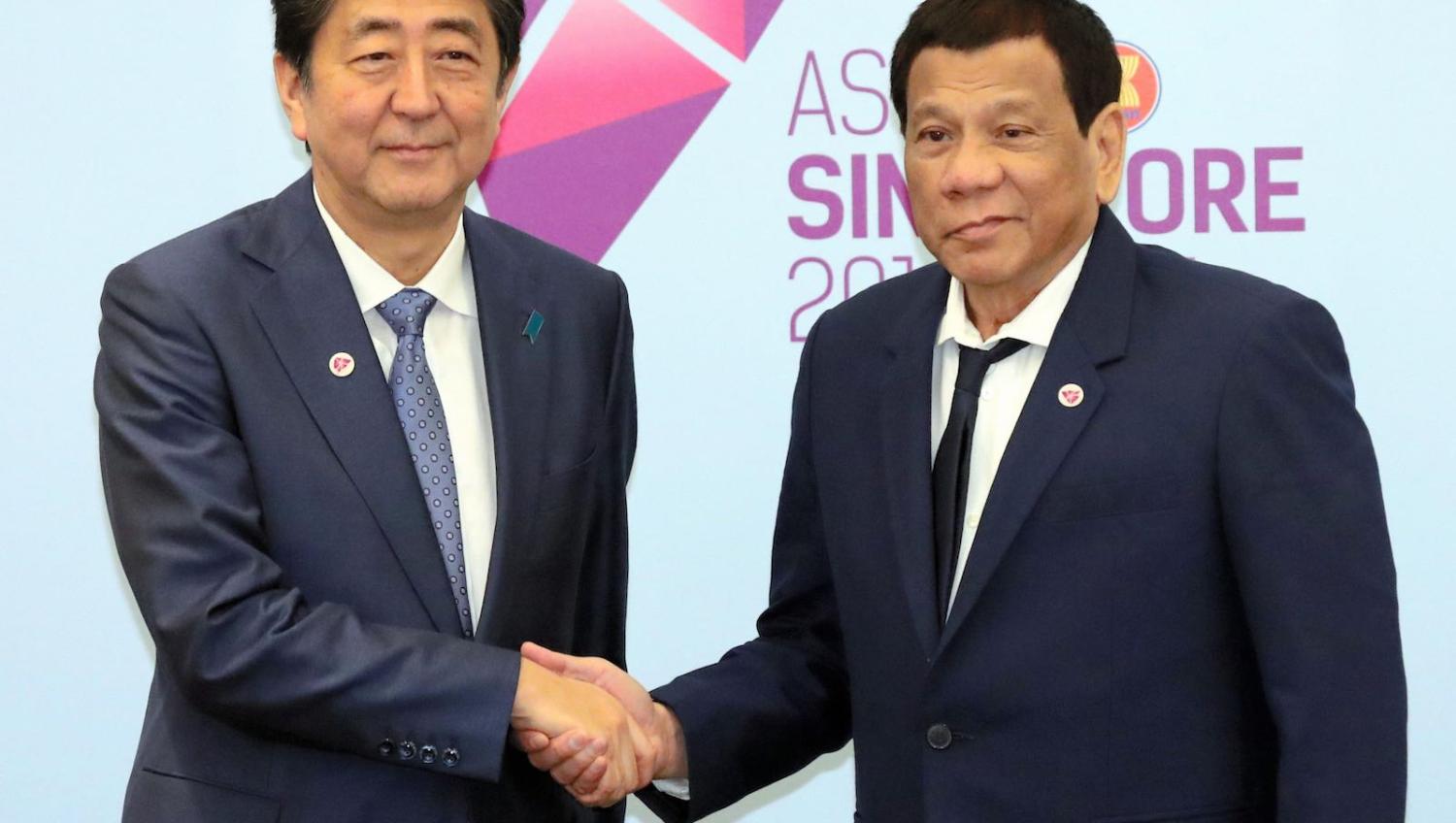 “Closer than brothers”: Japan’s Shinzo Abe and Philippine President Rodrigo Duterte in November 2018 (Photo: Asahi Shimbun via Getty)