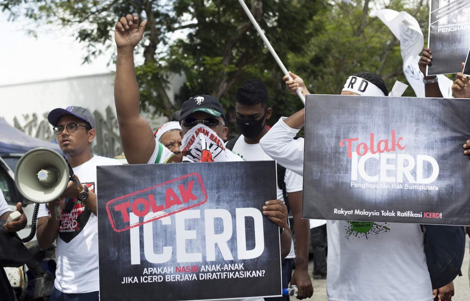 Opposition supporters gathered in Kuala Lumpur last year to celebrate a decision not to ratify the UN International Convention on the Elimination of All Forms of Racial Discrimination (Photo: Aizzat Nordin via Getty Images)