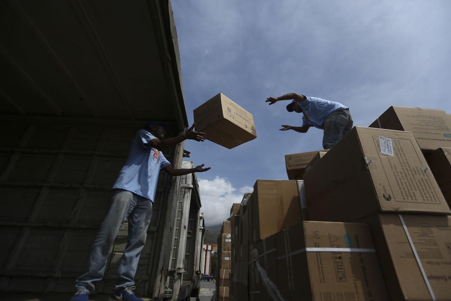 A delivery of 269 tons of medicines and surgical equipment from China arrives  in Caracas, Venezuela, 27 May 2019 (Ramses Mattey/NurPhoto via Getty)