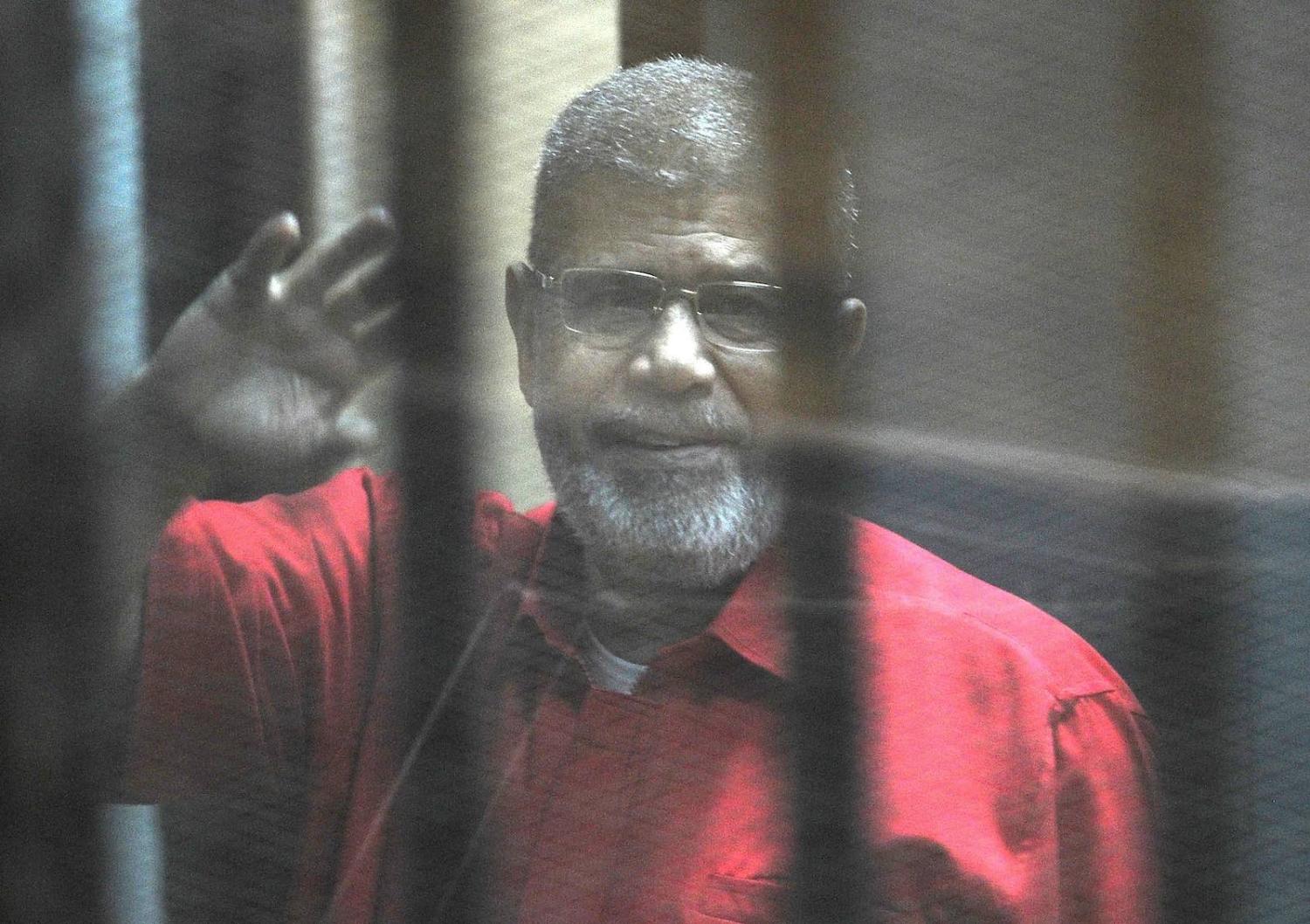 Former Egyptian president Mohamed Morsi in court in 2015 after his ousting (Photo: Ahmed Omar via Getty)