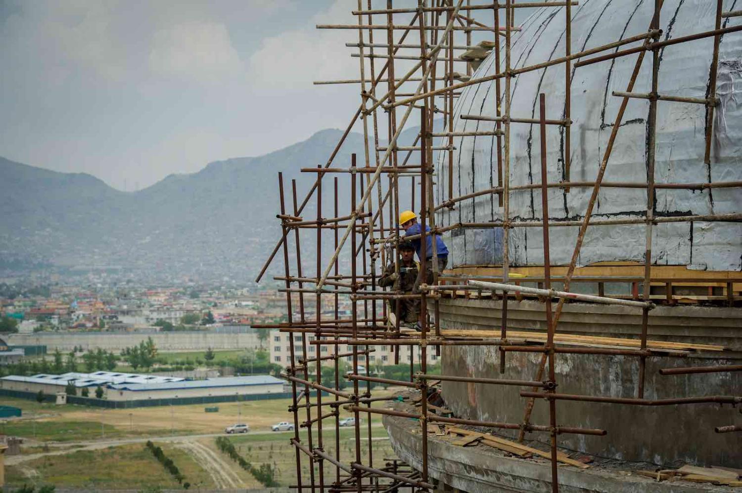 Restoration of Darulaman Palace in Kabul, in ruins since the Afghan civil war of the 1990s, in 2019 (Scott Peterson/Getty Images)