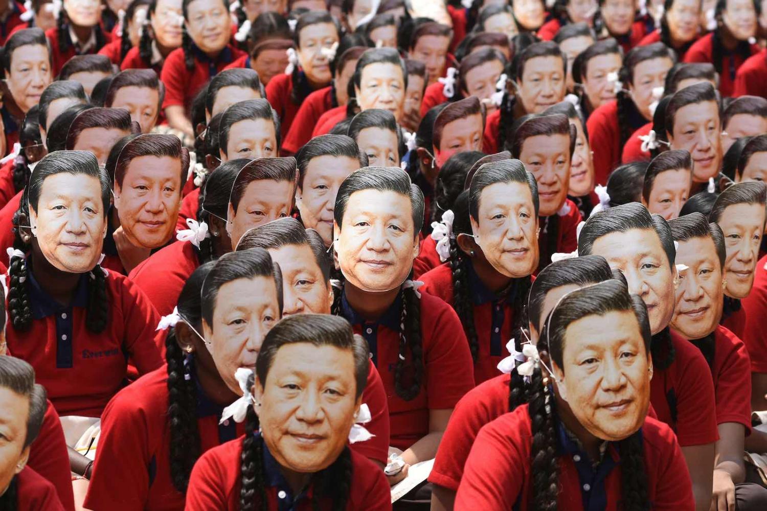 Indian school students wear masks of China’s President Xi Jinping in Chennai ahead of a summit in October with his Indian counterpart Narendra Modi at Mamallapuram (Arun Sankar/AFP via Getty Images)