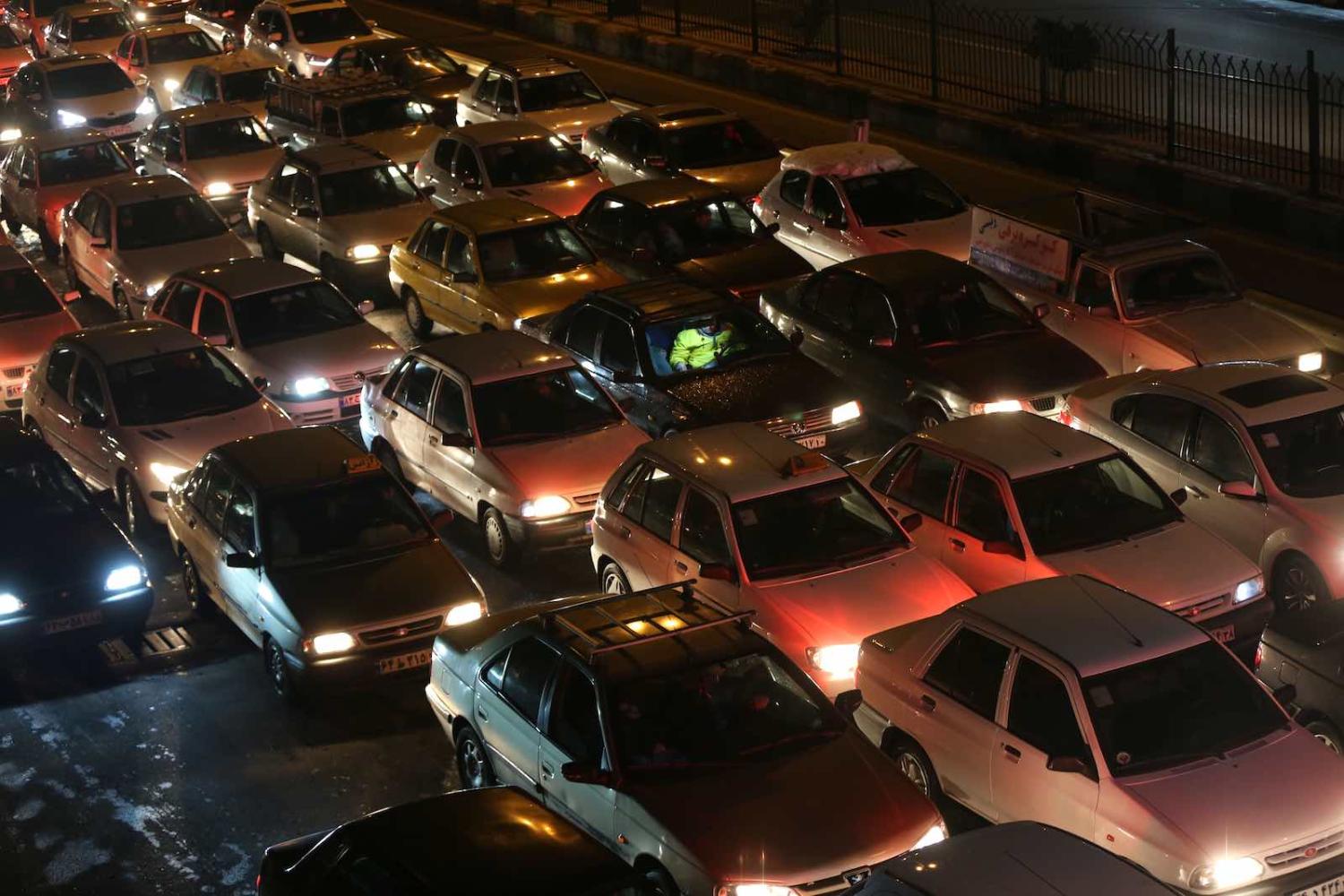 Drivers in Tehran switch off engines to block roads during a demonstration against a government decision to raise petrol prices, 16 November (Photo: Fatemeh Bahrami/Anadolu Agency via Getty)