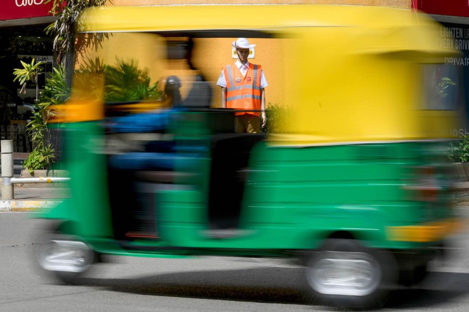 A mannequin dressed as a police officer at an intersection in Bangalore, a new recruit in the southern Indian city in a bid deter traffic offenders (Photo: Manjunath Kiran/AFP/Getty)