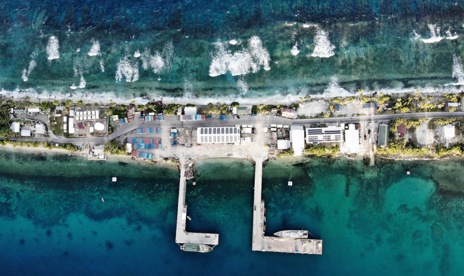 Funafuti, Tuvalu: an aerial view of the port between the Pacific Ocean (top) and lagoon, November 2019 (Mario Tama/Getty Images)