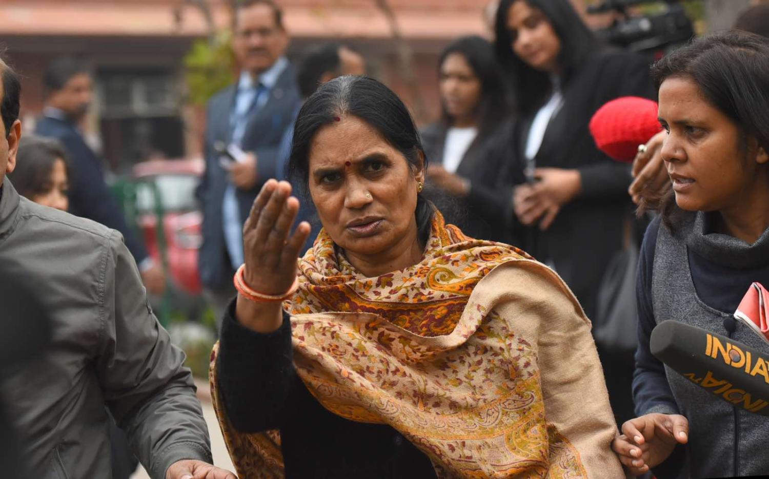 Asha Devi, mother of December 2012 gang rape victim Jyoti Singh, speaks to the media after a hearing at Supreme Court in New Delhi, 20 January (Photo: Raj K Raj/Hindustan Times via Getty)