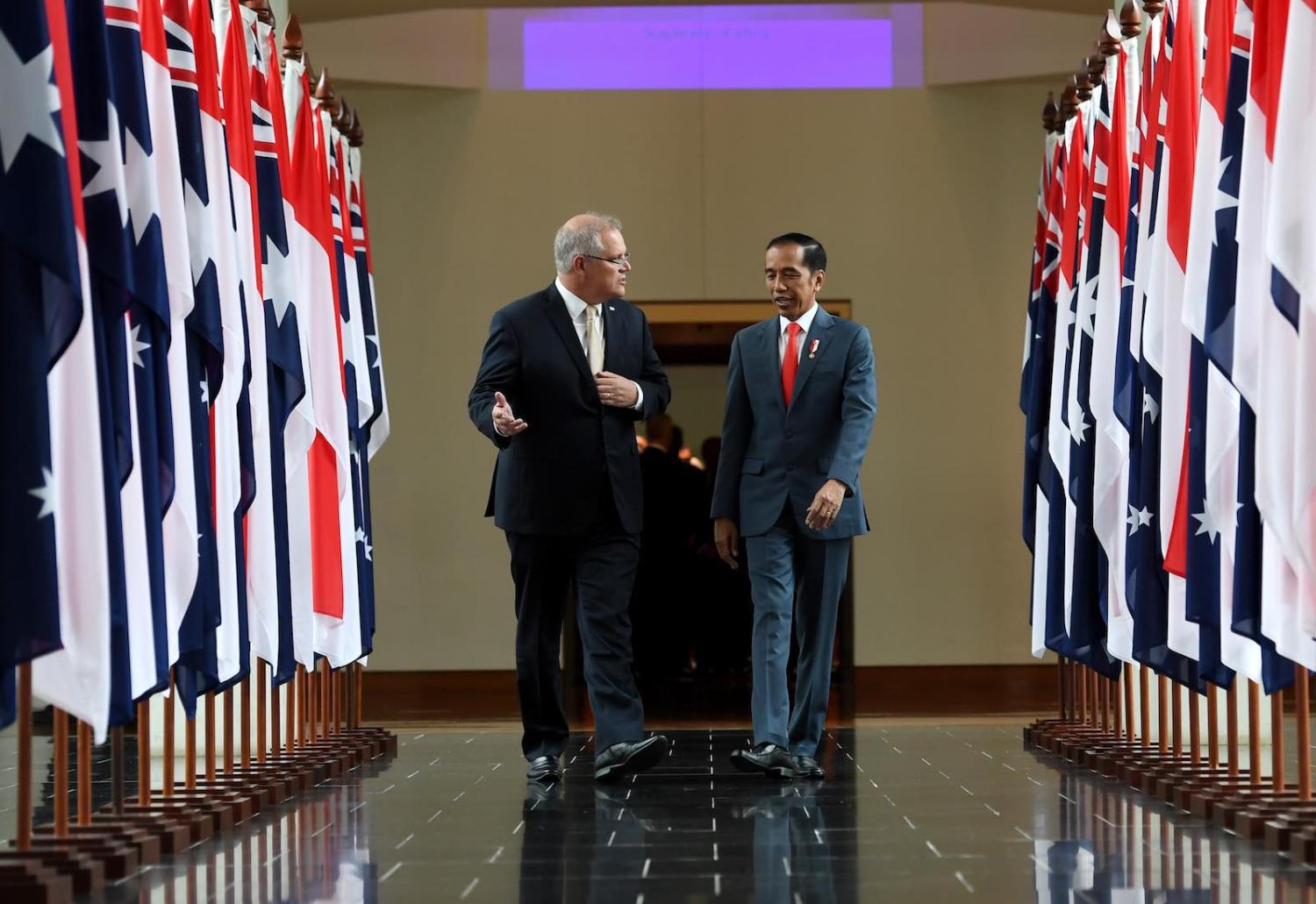 Australia’s Scott Morrison walks Indonesian President Joko Widodo through parliament house in Canberra (Photo: Tracey Nearmy/AFP/Getty Images)