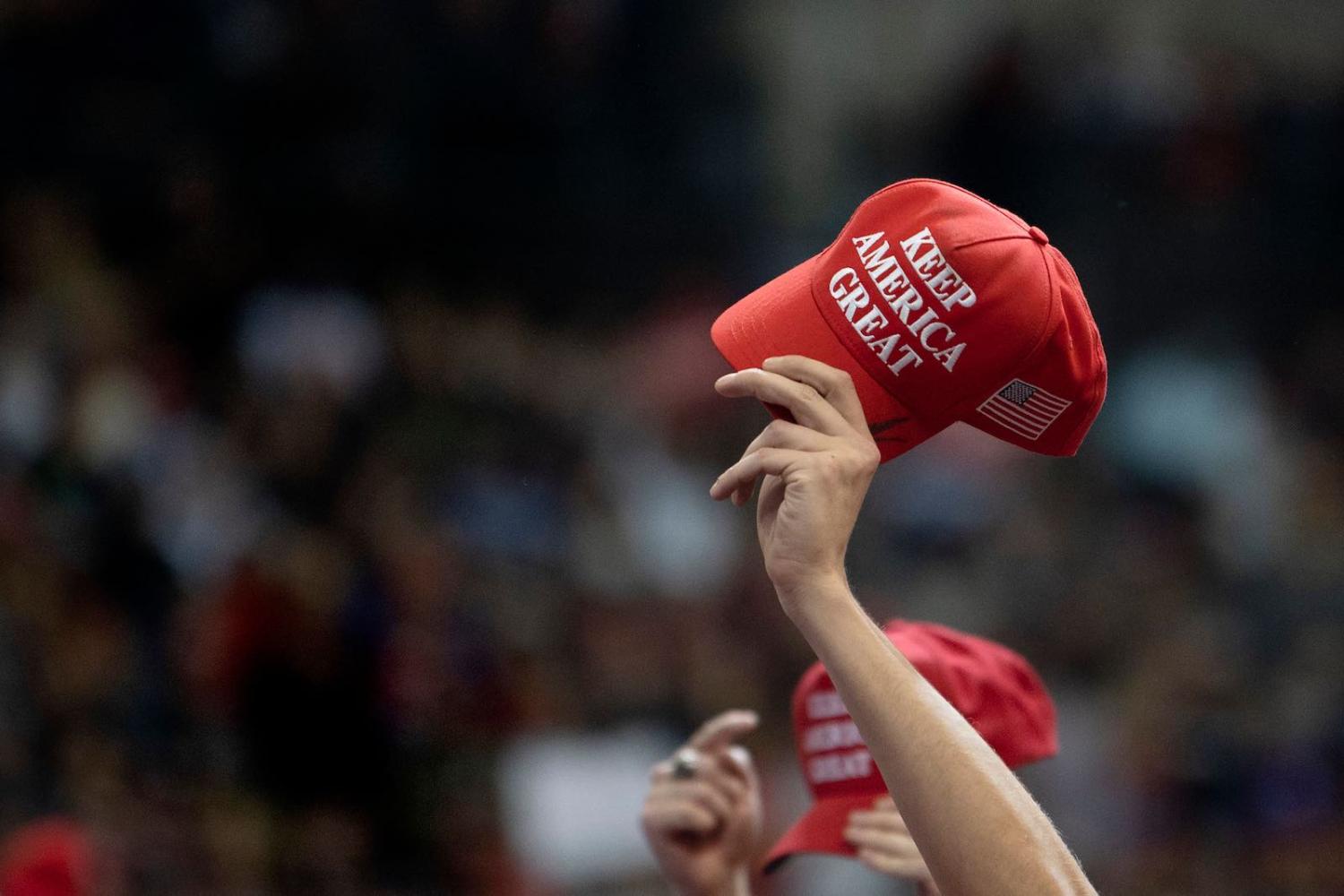 Caps and trade wars (Jim Watson/AFP via Getty Images)