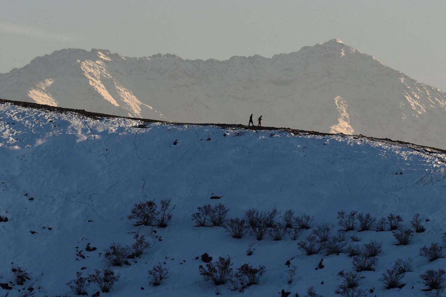 Walking the hillsides near Qargha Lake on the outskirts of Kabul (Wakil Kohsar/AFP/Getty Images)