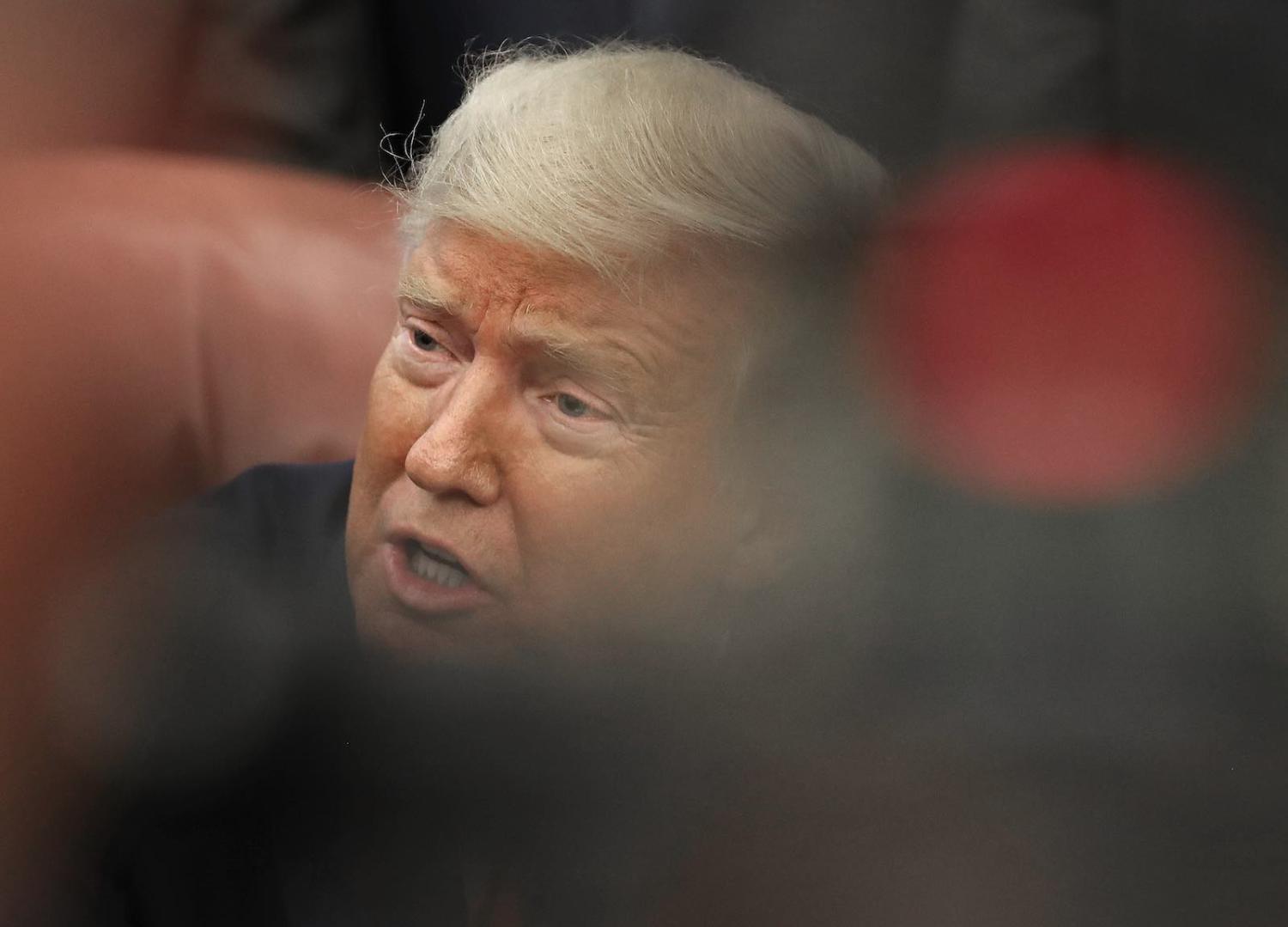 Donald Trump appears to revel in undermining US institutions as a way of energising his supporters (Mark Wilson/Getty Images)