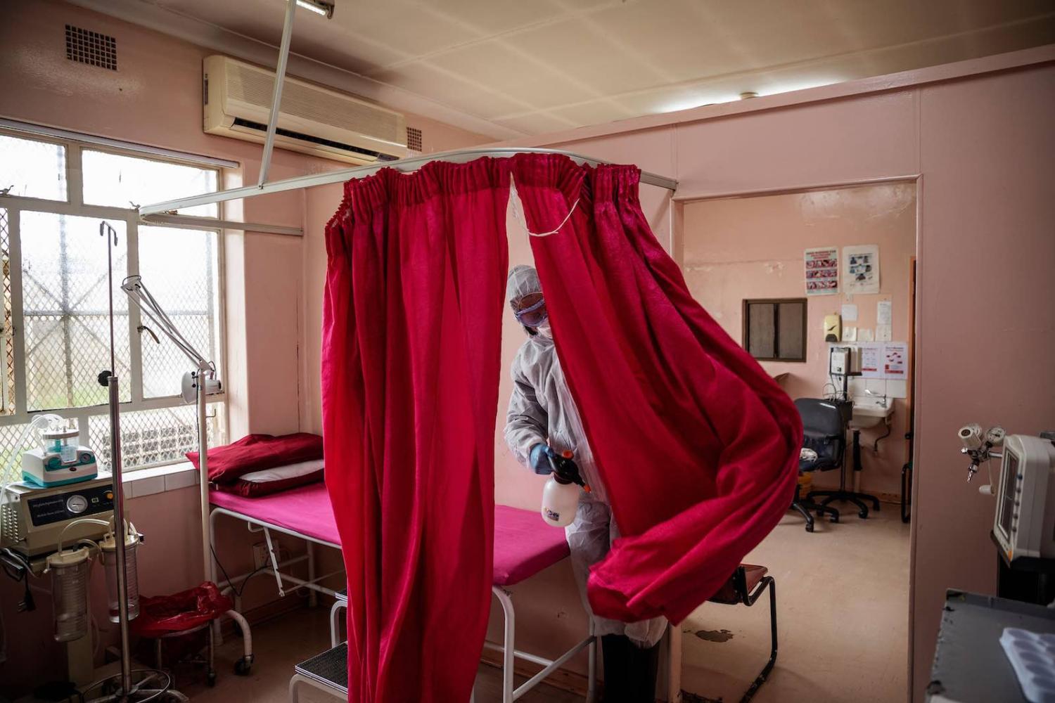 Disinfecting a clinic in Ekurhuleni, South Africa, after a nurse tested positive for Covid-19 (Michele Spatari/AFP/Getty Images)