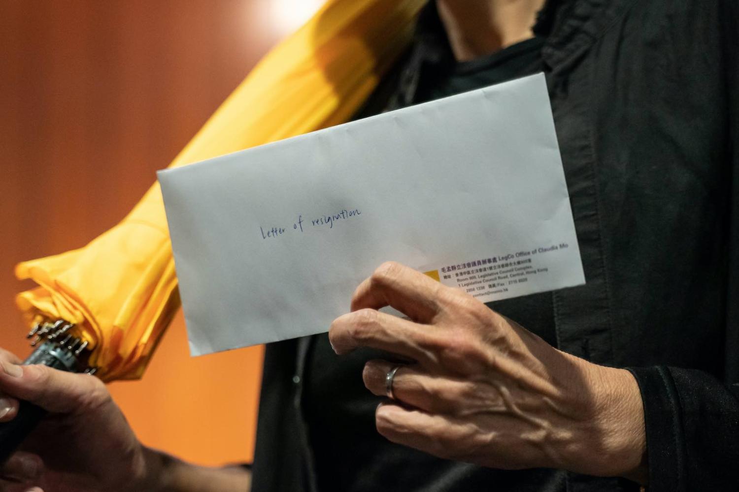 Hong Kong pro-democracy lawmaker Claudia Mo Man-ching arrives at the Legislative Council last week to tender her letter of resignation (Anthony Kwan/Getty Images)