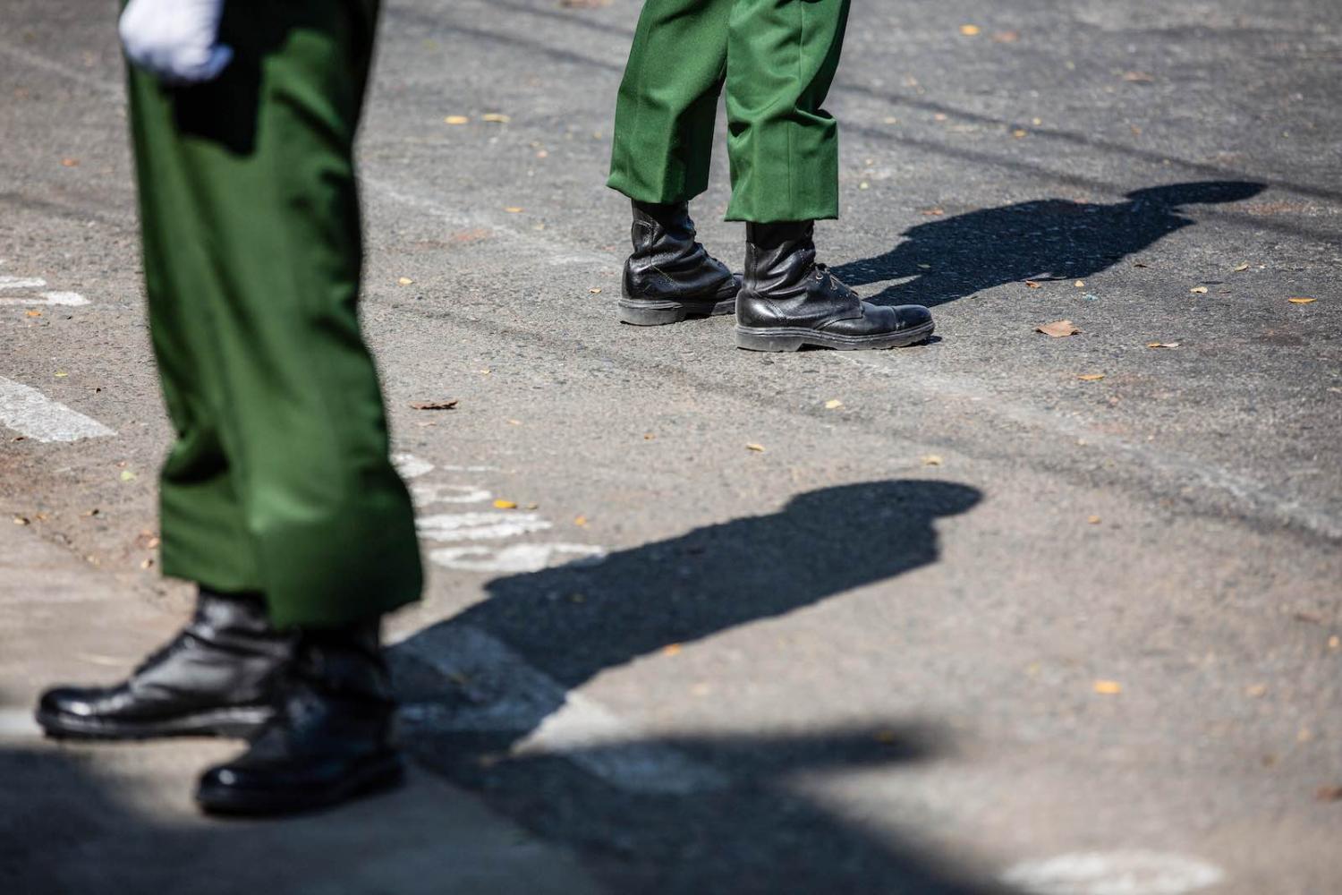 Soldiers stand guard outside Yangon Hindu temple in Yangon on 2 February (Aung Kyaw Htet via Getty Images)