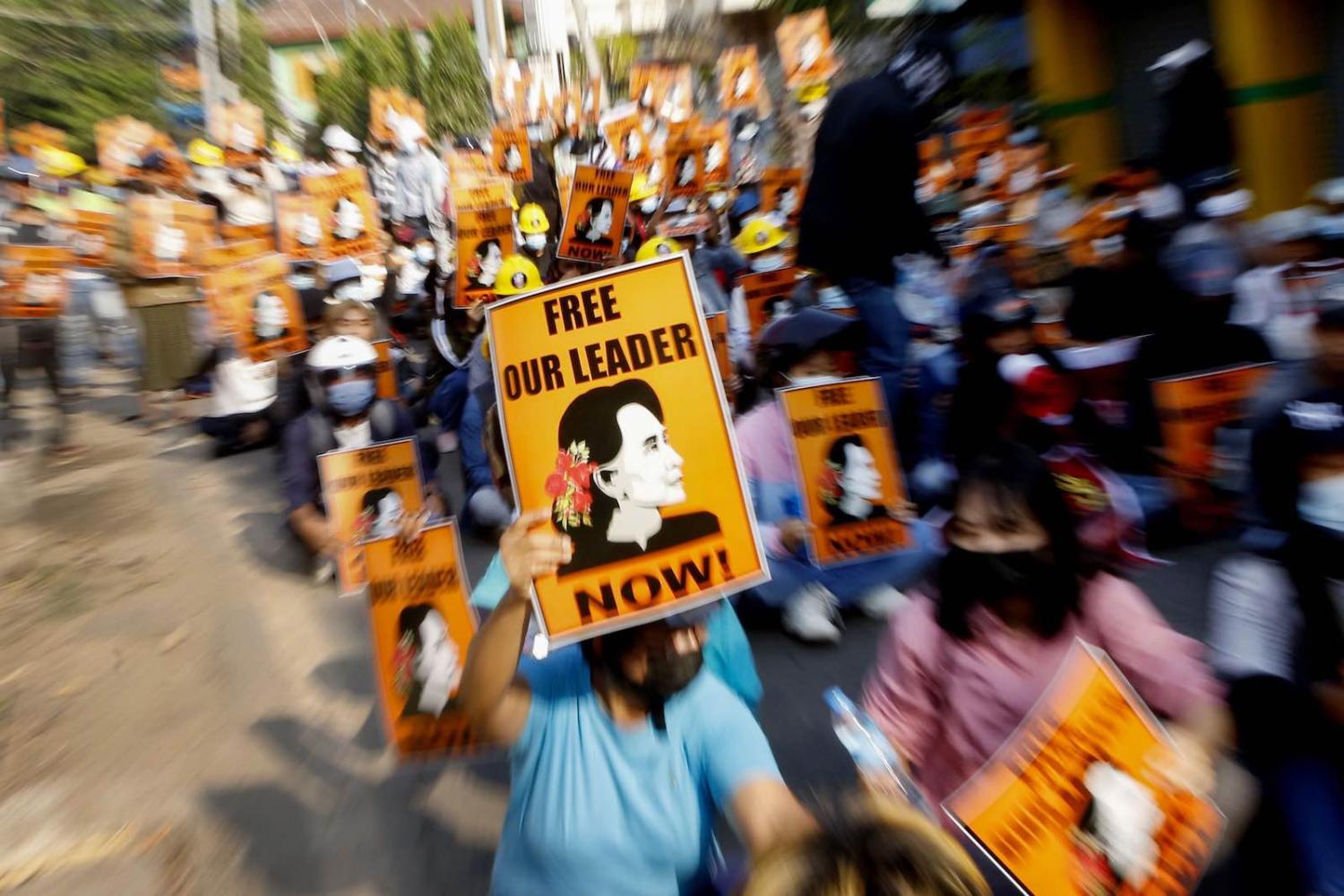 Placards demanding the release of detained Myanmar civilian leader Aung San Suu Kyi during a demonstration against the military coup in Naypyidaw on 4 March (STR/AFP via Getty Images)