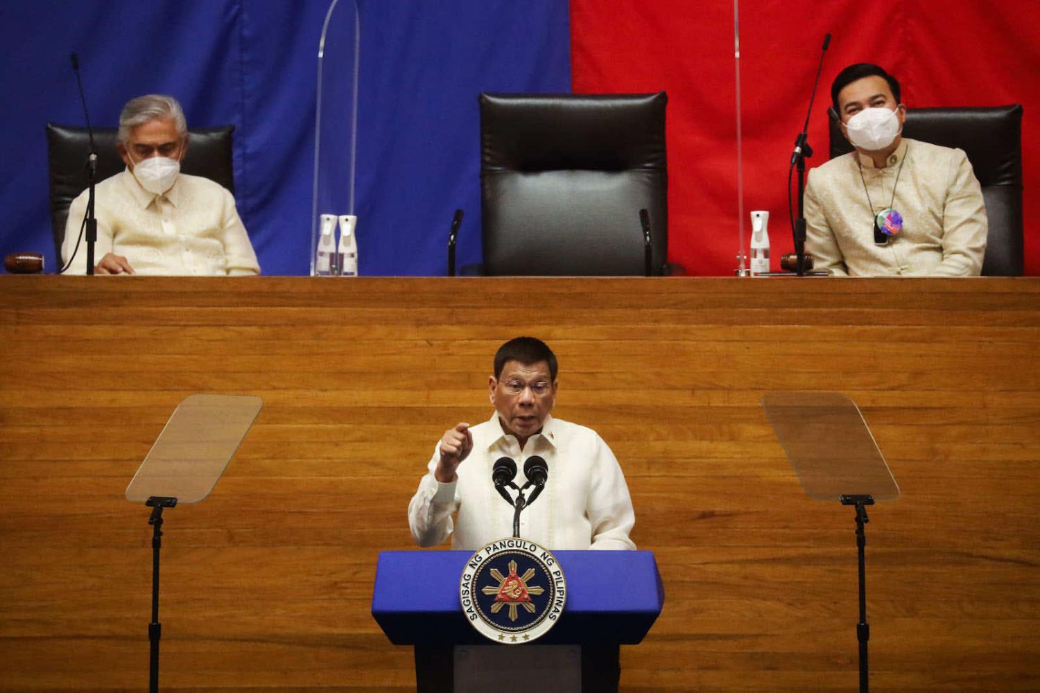Philippine President Rodrigo Duterte speaks during the annual state of the nation address at the House of Representatives in Manila on 26 July (Lisa Marie David/AFP via Getty Images)