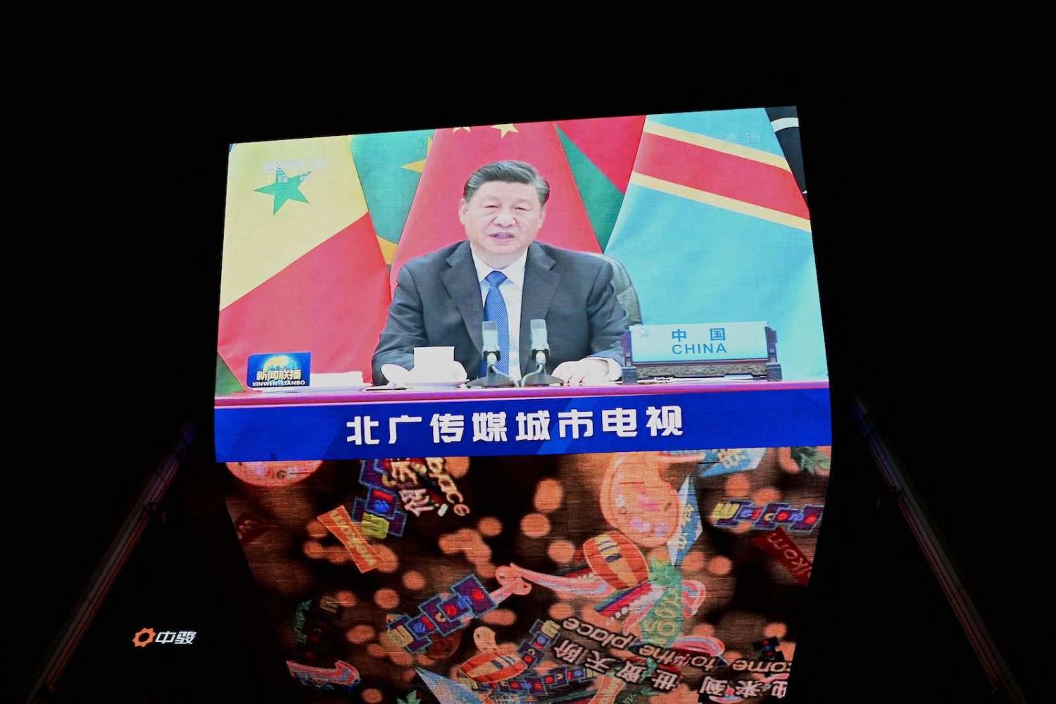 China's President Xi Jinping seen presenting to the China-Africa Cooperation forum last month (Noel Celis/AFP via Getty Images)
