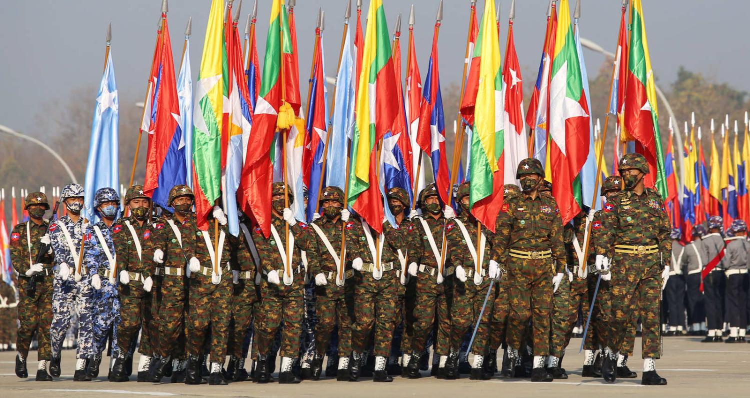 Myanmar junta military soldiers parade during a ceremony to mark the 75th anniversary of the country’s Union Day in Naypyidaw on 12 February (AFP via Getty Images)
