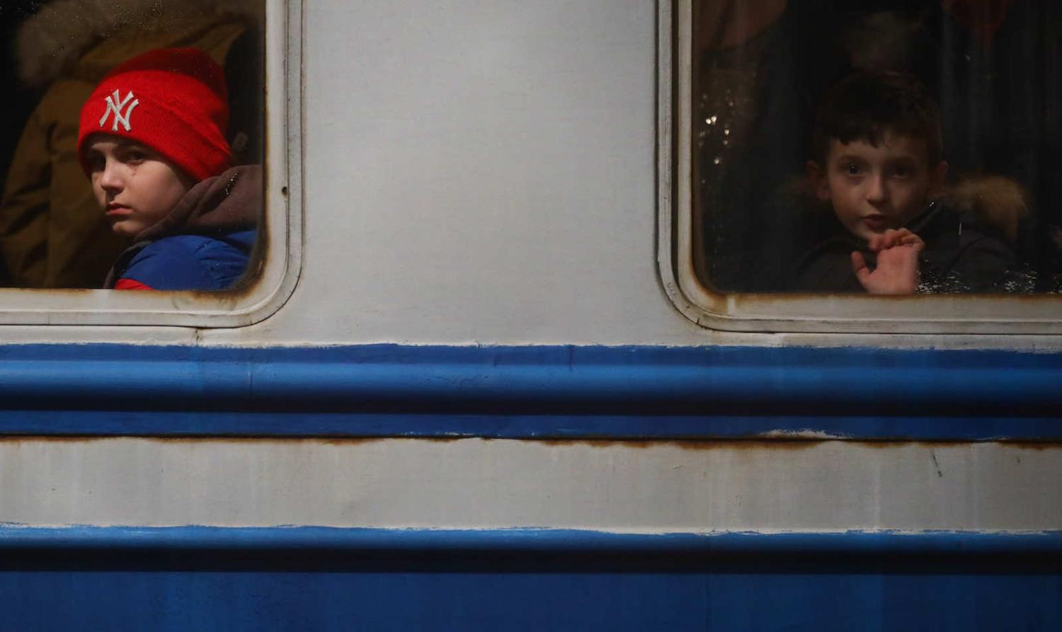 People from Ukraine arrive at the main railway station in Przemysl, Poland due to ongoing Russian attacks on Ukraine (Beata Zawrzel/Anadolu Agency via Getty Images)