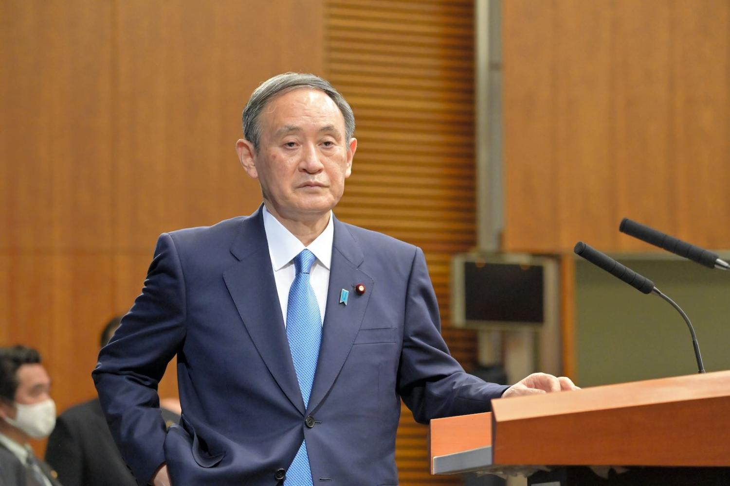 Japan’s Prime Minister Suga Yoshihide at a New Year press conference, 4 January in Tokyo (The Asahi Shimbun via Getty Images)