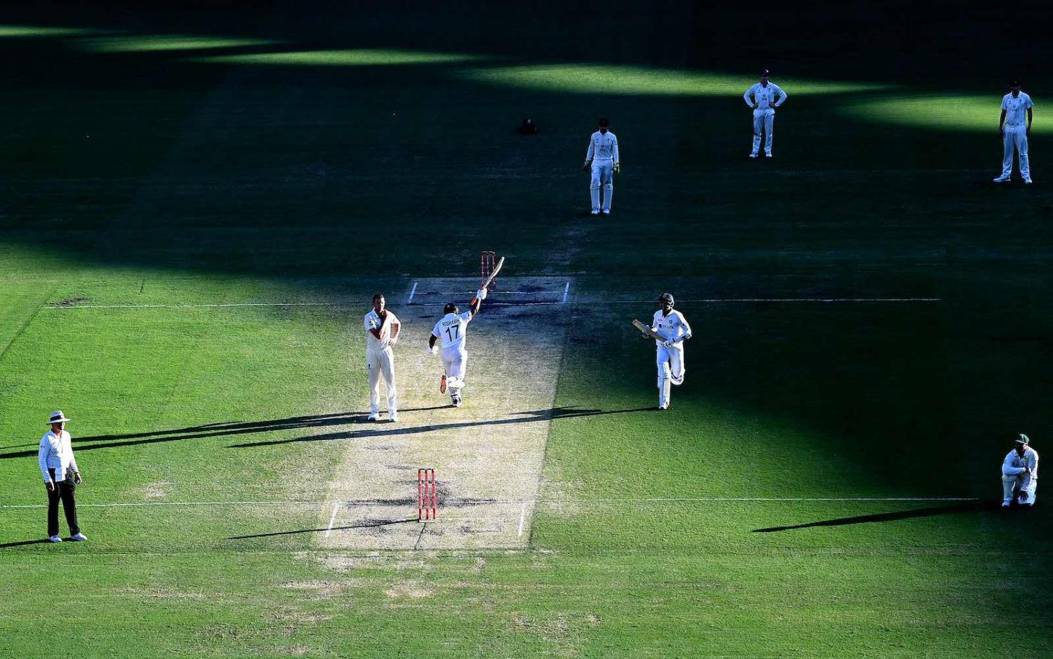 Rishabh Pant and Navdeep Saini of India celebrate victory after day five of the 4th Test Match in the series between Australia and India at The Gabba on 19 January 2021 in Brisbane, Australia (Bradley Kanaris/Getty Images)