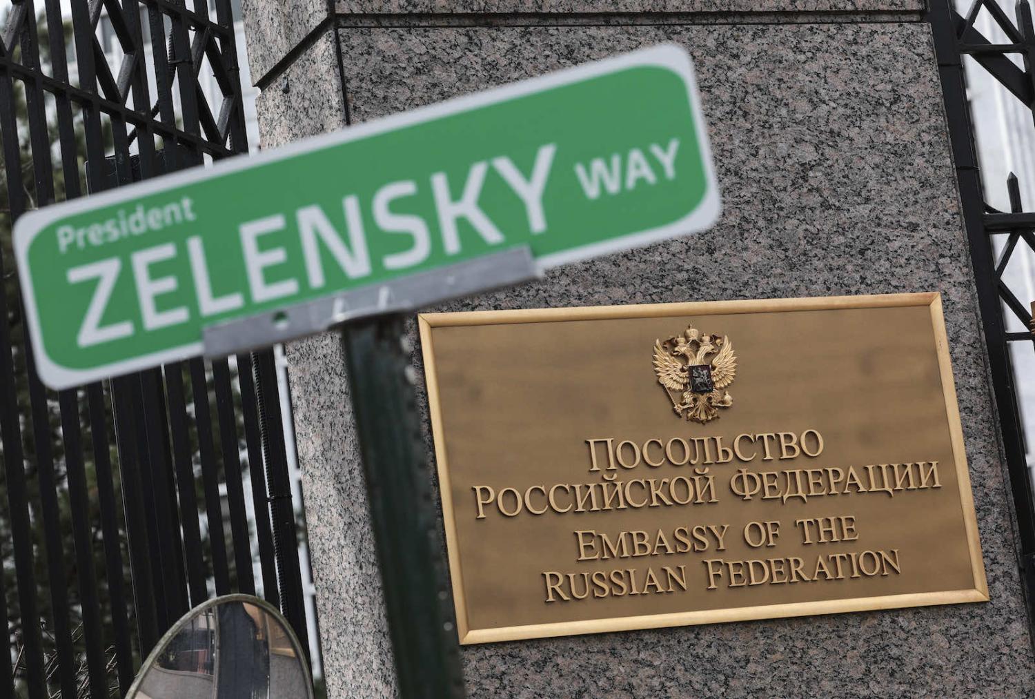 Protesters place a sign in support of Ukrainian President Volodymyr Zelensky outside of the Embassy of the Russian Federation in Washington DC (Kevin Dietsch/Getty Images)