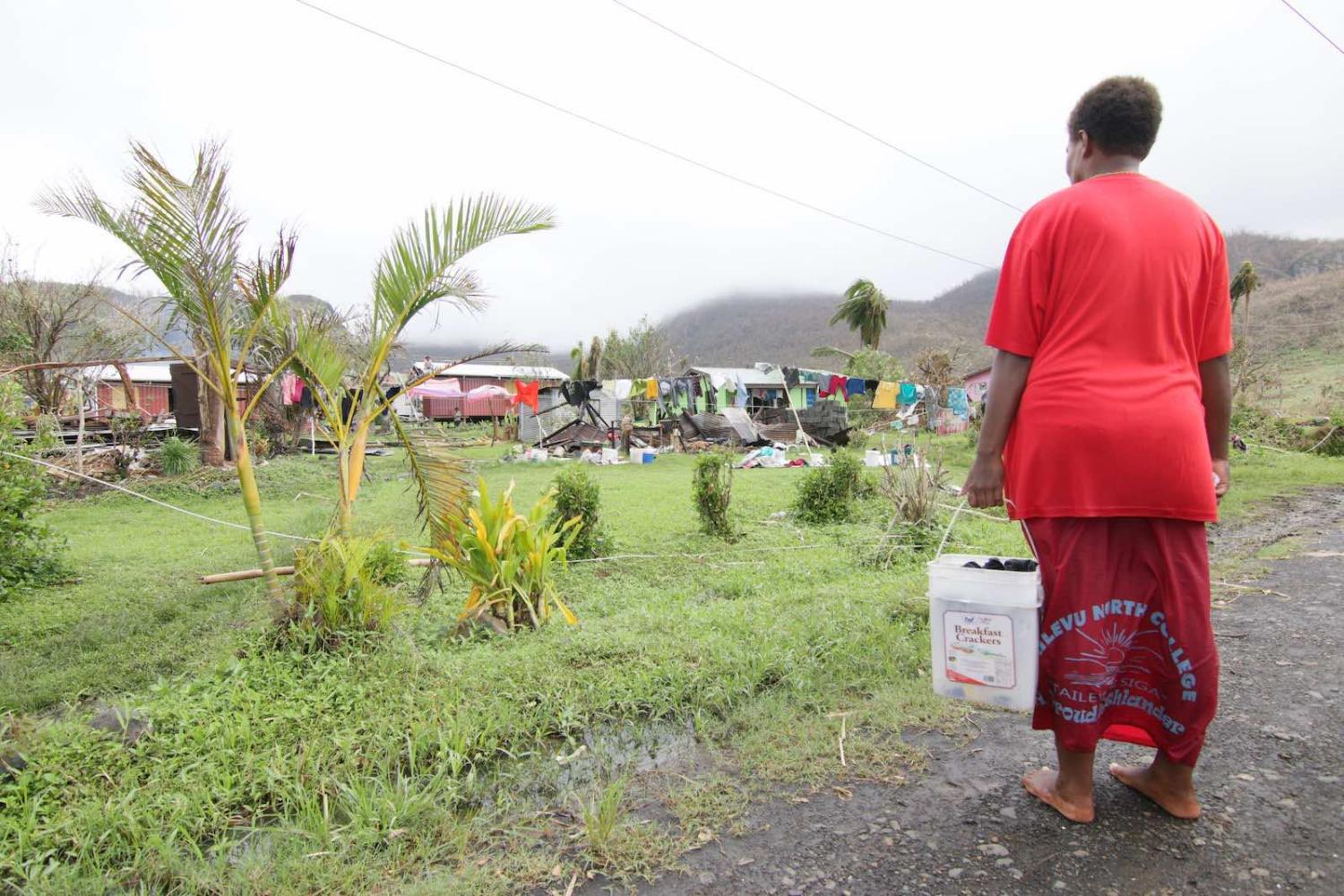 Inspecting damage at Nokonoko settlement in Fiji caused in 2016 by Cyclone Winston (Steven Saphore/AFP via Getty Images)