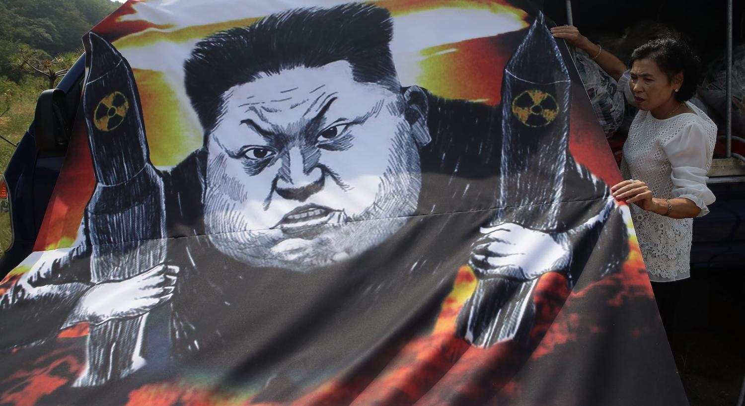 A North Korean defector with balloons carrying propaganda leaflets in 2016 near the demilitarised zone (Photo: Chung Sung-Jun/Getty)